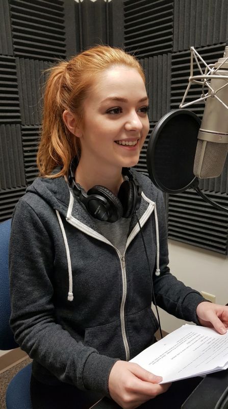 Becca recording a podcast
